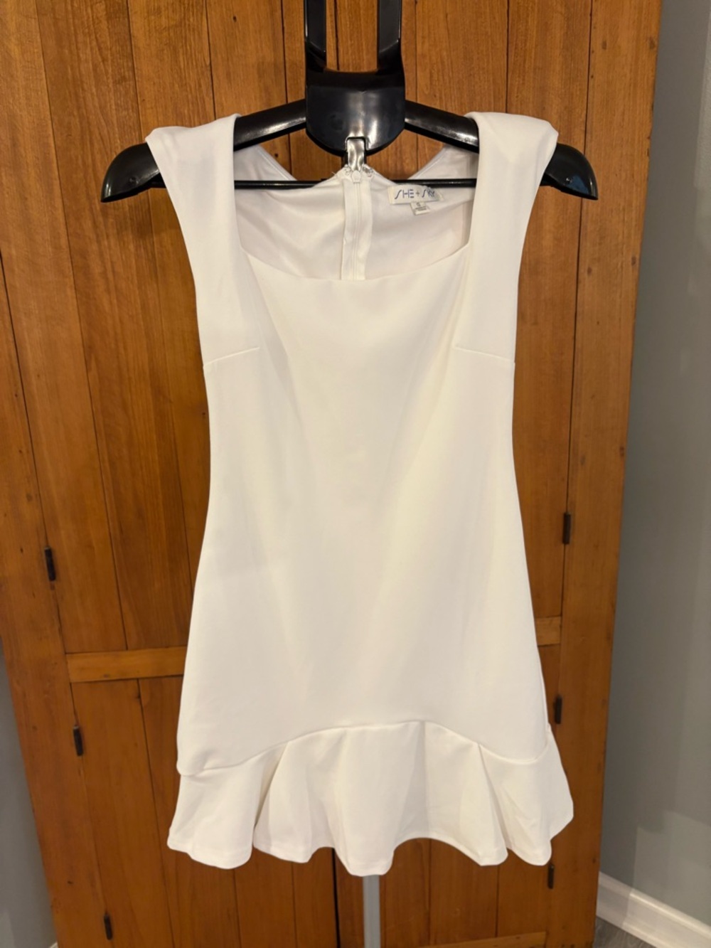 She + Sky White Sleeveless Ruffle-Hem Mini Dress